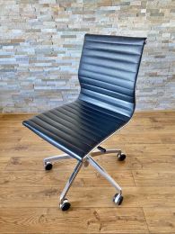 Adjustable Eames Style Chair in Black Faux Leather.
