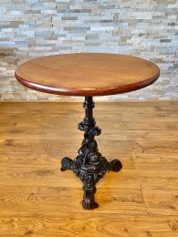 Used Bar / Bistro Table with Heavy Ornate Cast Base.